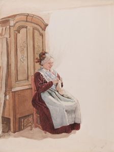 Apparel - Handicraft woman in full figure sitting in front of a cupboard. (c1900s). Creator: AJG Virgin