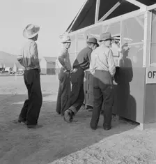 Applicants at registration tent on opening day...FSA camp, Merrill, Klamath County, Oregon, 1939. Creator: Dorothea Lange
