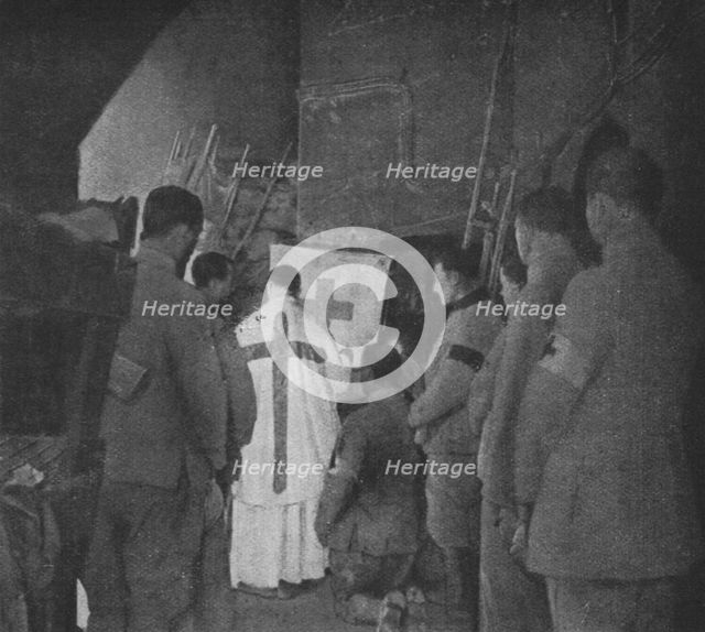 'Apres la reprise du Fort de Vaux; la premiere messe, dans une casemate du fort reconquis', 1916. Creator: Unknown.