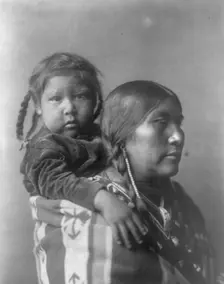 Apsaroke mother, c1908. Creator: Edward Sheriff Curtis