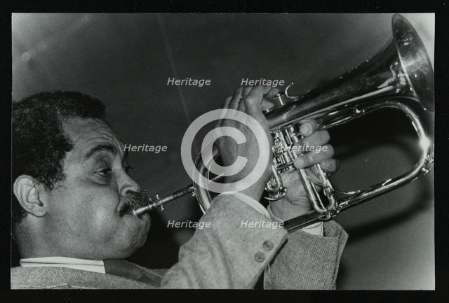 Art Farmer on the flugelhorn at The Bell, Codicote, Hertfordshire, 25 February 1985. Creator: Denis Williams.