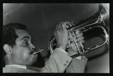 Art Farmer on the flugelhorn at The Bell, Codicote, Hertfordshire, 25 February 1985. Creator: Denis Williams