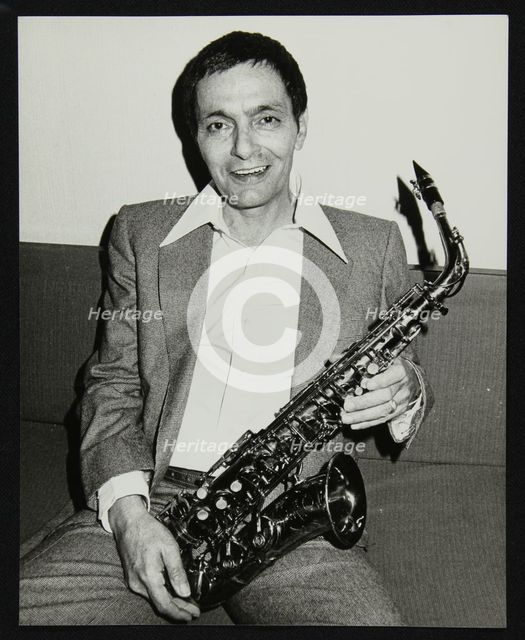 Art Pepper holding his saxophone, Royal Festival Hall, London, 14 July, 1980. Creator: Denis Williams.