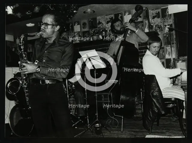 Art Themen, Dave Green, and Michael Garrick playing at The Bell, Codicote, Hertfordshire, 1981. Creator: Denis Williams.
