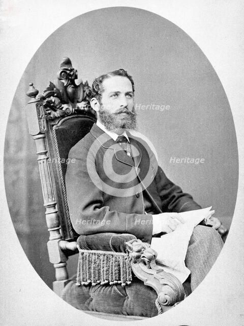 Arthur Schuster, seated, facing left, aged about 38, c1888. Creator: L Suscipj.