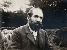 Arthur Schuster, seated, facing left, aged about 50, c1901. Creator: Unknown