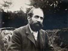 Arthur Schuster, seated, facing left, aged about 50, c1901. Creator: Unknown