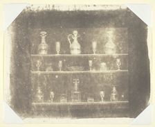 Articles of Glass on Three Shelves, c. 1844. Creator: William Henry Fox Talbot
