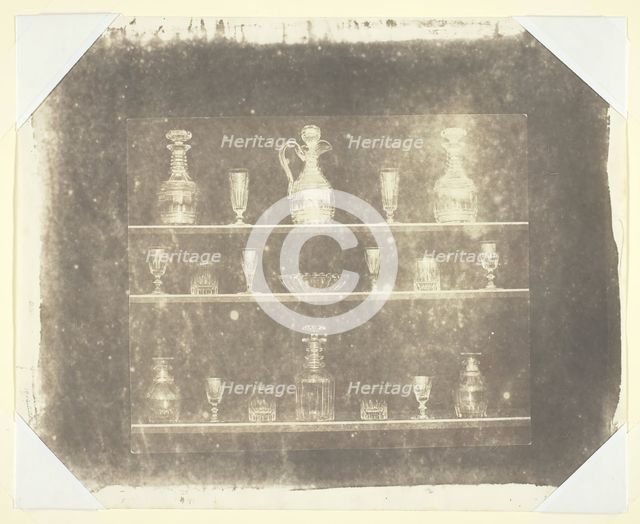 Articles of Glass on Three Shelves, c. 1844. Creator: William Henry Fox Talbot.