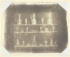 Articles of Glass on Three Shelves, c. 1844. Creator: William Henry Fox Talbot