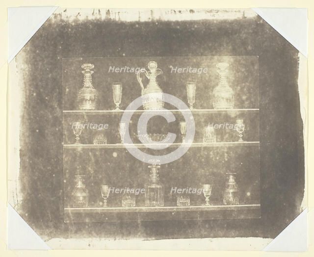 Articles of Glass on Three Shelves, c. 1844. Creator: William Henry Fox Talbot.