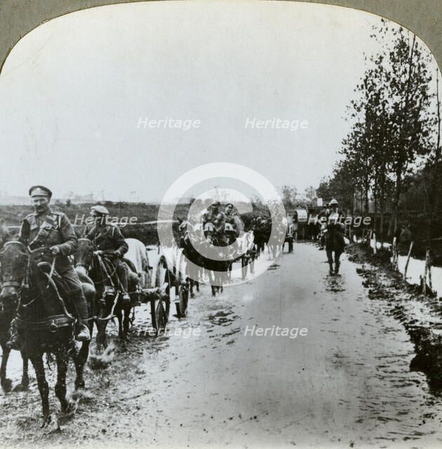 Artillery making their way through mud to Gommecourt, France, World War I, c1914-c1918. Artist: Realistic Travels Publishers