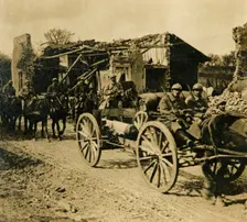 Artillery passing through Beauzée, northern France, c1914-c1918