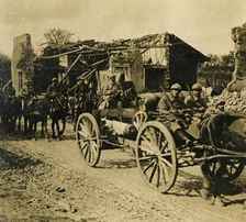 Artillery passing through Beauzée, northern France, c1914-c1918