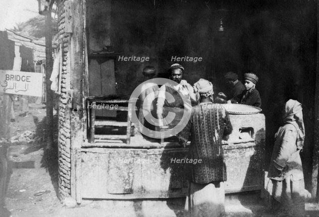 Arab cook, Aleppo road, Baghdad, Iraq, 1917-1919. Artist: Unknown