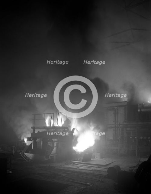 Arc furnace in a steelworks, Sheffield, South Yorkshire, 1964.  Creator: Michael Walters.
