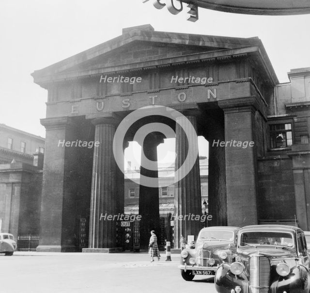 Arch outside the main entrance to Euston Station, Camden, London, 1952. Creator: Henry Grant.