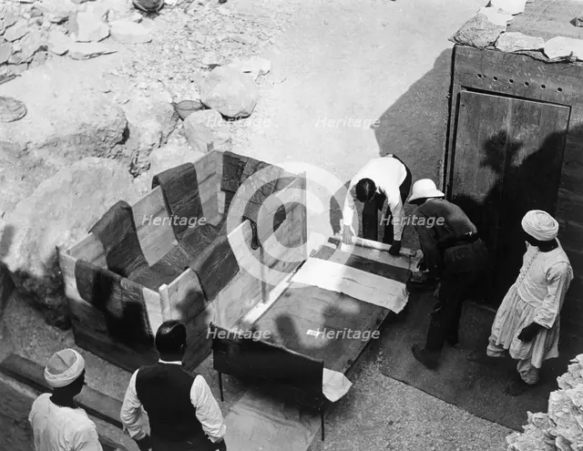 Archaeologists working  at the Tomb of Tutankhamun, Valley of the Kings, Egypt, 1922. Creator: Harry Burton.