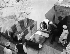 Archaeologists working at the Tomb of Tutankhamun, Valley of the Kings, Egypt, 1922. Creator: Harry Burton