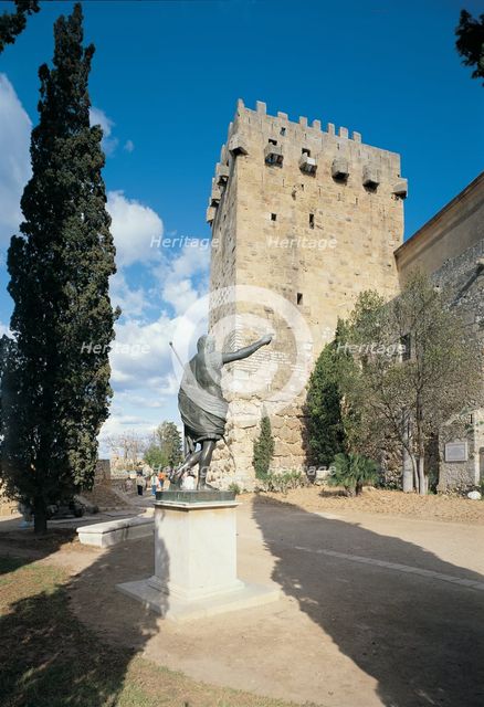 Archbishop tower 197 ad.C and statue of Emperor Augustus alongside the city walls built by the Ro…