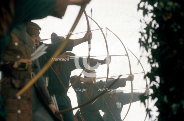 Archers in a battle re-enactment. Artist: Geoffrey Davis