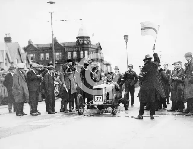 Archie Frazer-Nash waiting at the start of a motor racing event. Artist: Unknown