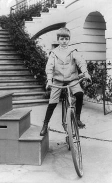 Archie Roosevelt on a bicycle, c1902 June 17. Creator: Frances Benjamin Johnston