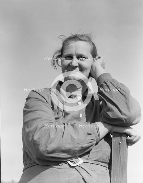Arkansas mother, now a rural rehabilitation client, Tulare County, California, 1938. Creator: Dorothea Lange.