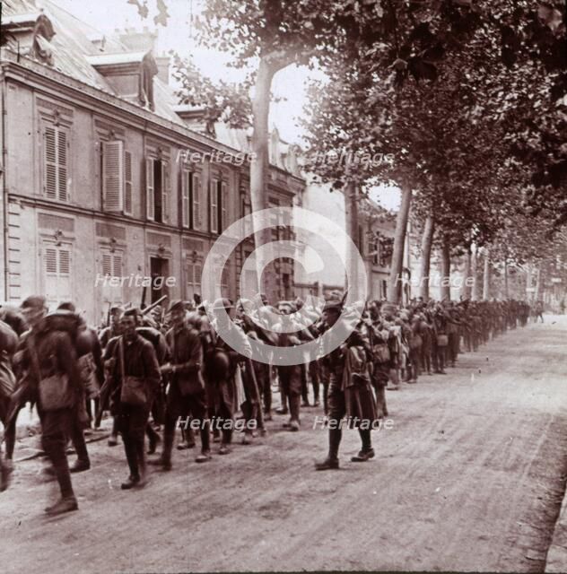 Armed troops, Chateau Thierry, France, c1914-c1918. Artist: Unknown.