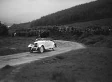 Armstrong-Siddeley open 2-seater competing in the Caerphilly Hillclimb, Wales, 1922. Artist: Bill Brunell