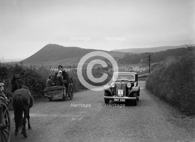 Armstrong-Siddeley saloon of FN Morgan competing in the South Wales Auto Club Welsh Rally, 1937 Artist: Bill Brunell.