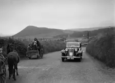 Armstrong-Siddeley saloon of FN Morgan competing in the South Wales Auto Club Welsh Rally, 1937 Artist: Bill Brunell