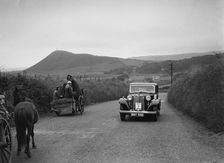Armstrong-Siddeley saloon of FN Morgan competing in the South Wales Auto Club Welsh Rally, 1937 Artist: Bill Brunell