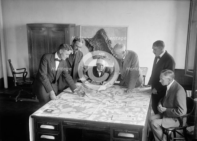 Army War Game - Lt. Col. D.E. Aultman; Lt. Col. J.A. Shipton; Major L. Wahl; Col. George H..., 1917. Creator: Harris & Ewing.