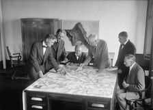 Army War Game - Lt. Col. D.E. Aultman; Lt. Col. J.A. Shipton; Major L. Wahl; Col. George H..., 1917. Creator: Harris & Ewing