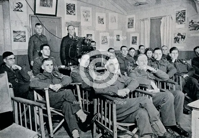 'Army Art Group: Adrian Hill, R.B.A., R.O.I., lecturing on The Art and Aims of Picasso', 1944. Artist: Unknown.