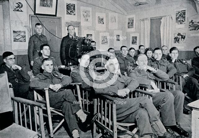 'Army Art Group: Adrian Hill, R.B.A., R.O.I., lecturing on The Art and Aims of Picasso', 1944. Artist: Unknown.