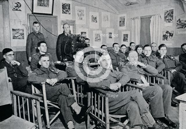 'Army Art Group: Adrian Hill, R.B.A., R.O.I., lecturing on The Art and Aims of Picasso', 1944. Artist: Unknown.