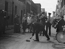 Army contributes first to the tambourine..., Salvation Army, San Francisco, California, 1939. Creator: Dorothea Lange