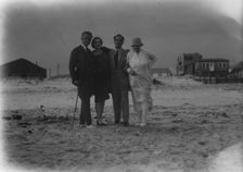Arnold Genthe with friends in Long Beach, New York, between 1911 and 1942. Creator: Arnold Genthe