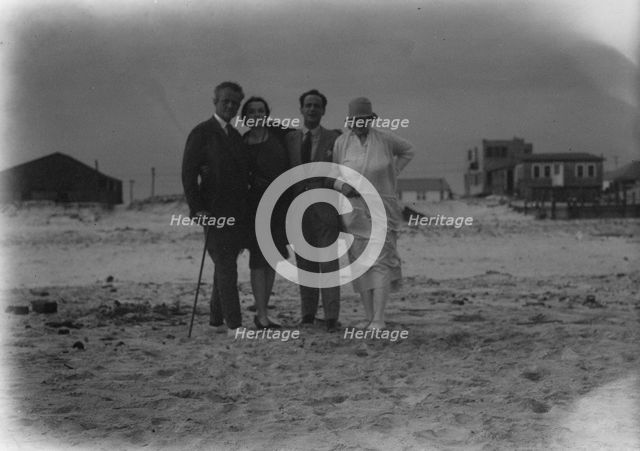 Arnold Genthe with friends in Long Beach, New York, between 1911 and 1942. Creator: Arnold Genthe.