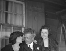 Arnold Genthe with two women friends on the porch of his bungalow in Long Beach, N.Y., c1911-c1942. Creator: Arnold Genthe