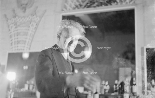 Arnold Genthe at a party, restaurant, or nightclub, between 1911 and 1942. Creator: Arnold Genthe.