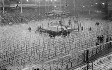 Arranging Madison Square Garden for Frank Moran and Jess Willard fight, 1916. Creator: Bain News Service