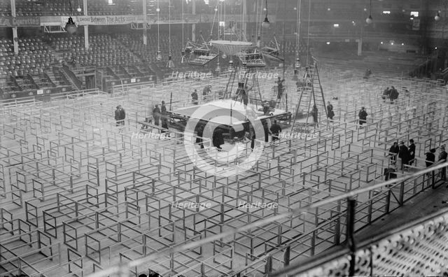 Arranging Madison Square Garden for Frank Moran and Jess Willard fight, 1916.  Creator: Bain News Service.