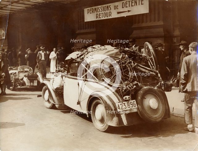 Arrival by car of refugees from Belgium in Paris, World War II, May 1940. Artist: Unknown
