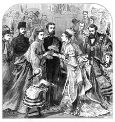 Arrival of the Duke and Duchess of Edinburgh at Gravesend:...presenting a bouquet to the bride, 1874 Creator: Unknown