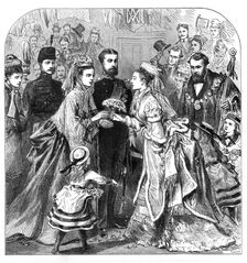 Arrival of the Duke and Duchess of Edinburgh at Gravesend:...presenting a bouquet to the bride, 1874 Creator: Unknown