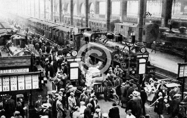 Arrival of Train at North Station, Paris, 1931.Artist: Ernest Flammarion