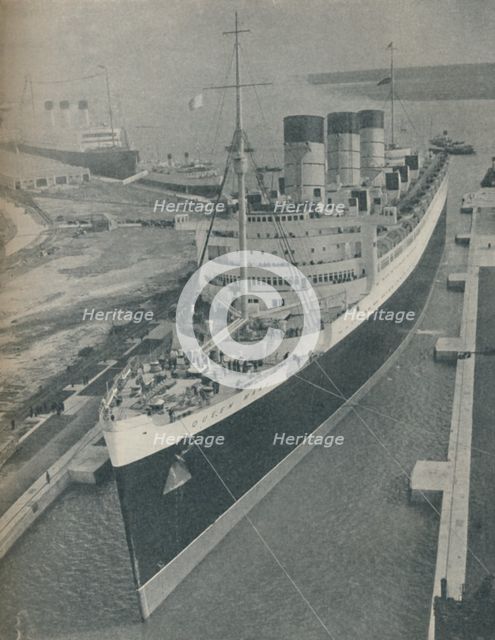 'Arrival of RMS Cunard White Star liner Queen Mary in King George V Graving Dock', 1936. Artist: Unknown.